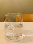 A glass of water on a table

AI-generated content may be incorrect.