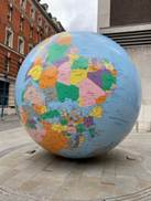 A large globe with a map on it

Description automatically generated