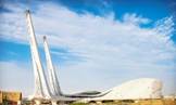 A white structure with a blue sky

AI-generated content may be incorrect.